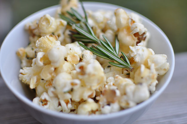 Popcorn with Grated Asiago, Cracked Black Pepper, and Wild Mushroom-Sage Olive Oil